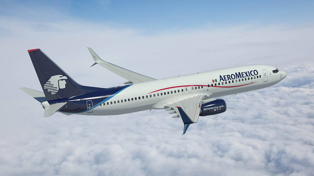 Aeromexico Airline Boeing 737-800 Over Fluffy Clouds Wallpaper