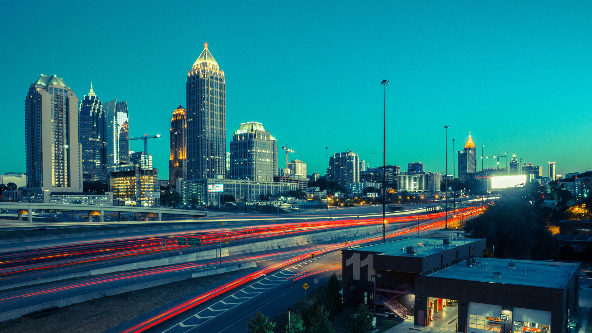 Aesthetic Atlanta Skyline With Trail Lights Wallpaper