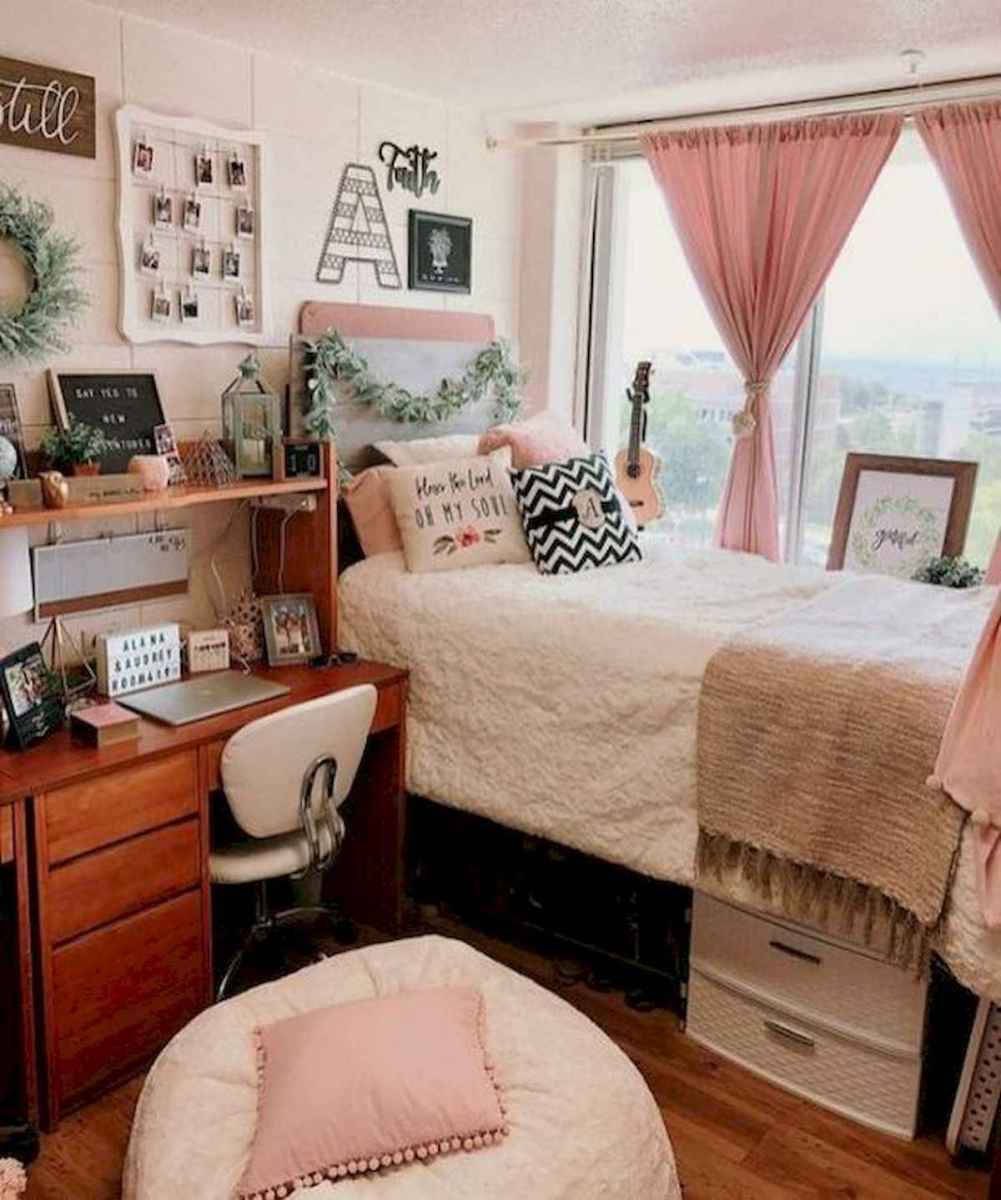 A Dorm Room With Pink And White Decor Wallpaper