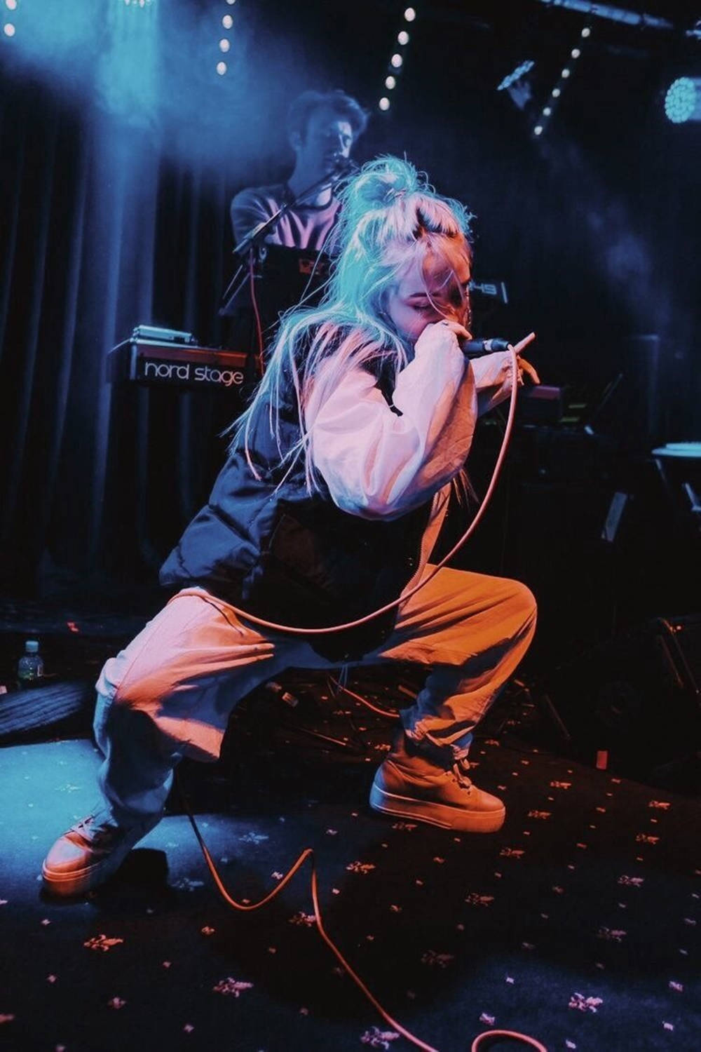 Aesthetic Billie Eilish Performing With Band Background