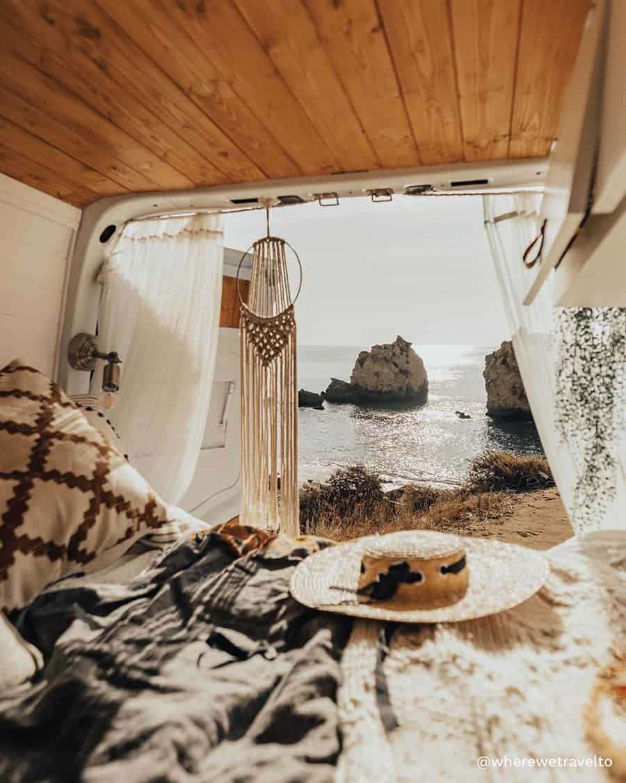 A Bed In A Van With A View Of The Ocean