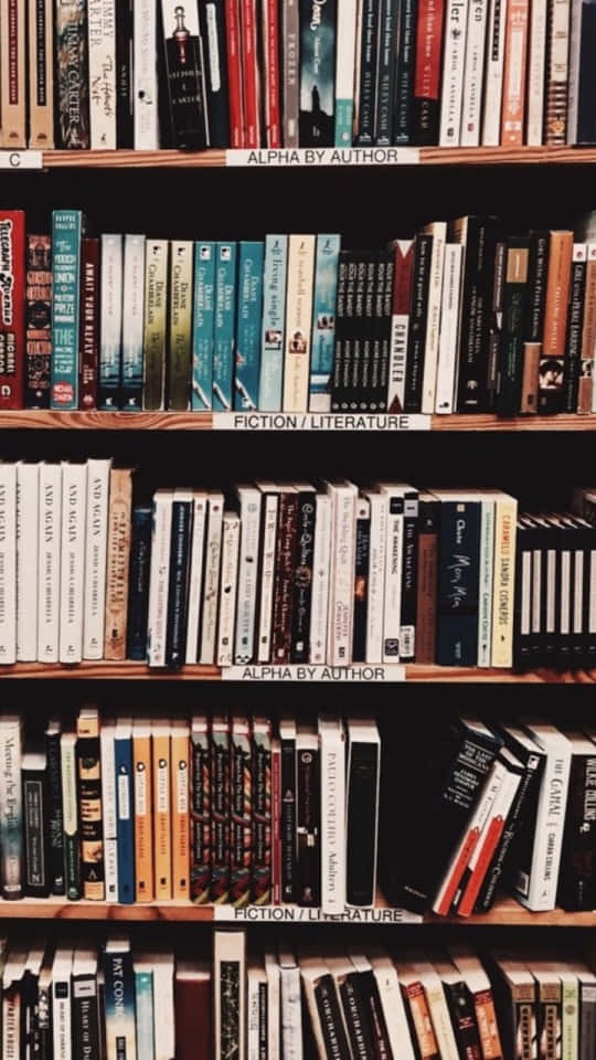 A Shelf Full Of Books On A Shelf