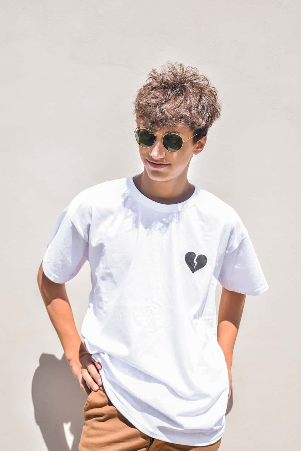 Download A Young Man Wearing Sunglasses And A White T - Shirt ...