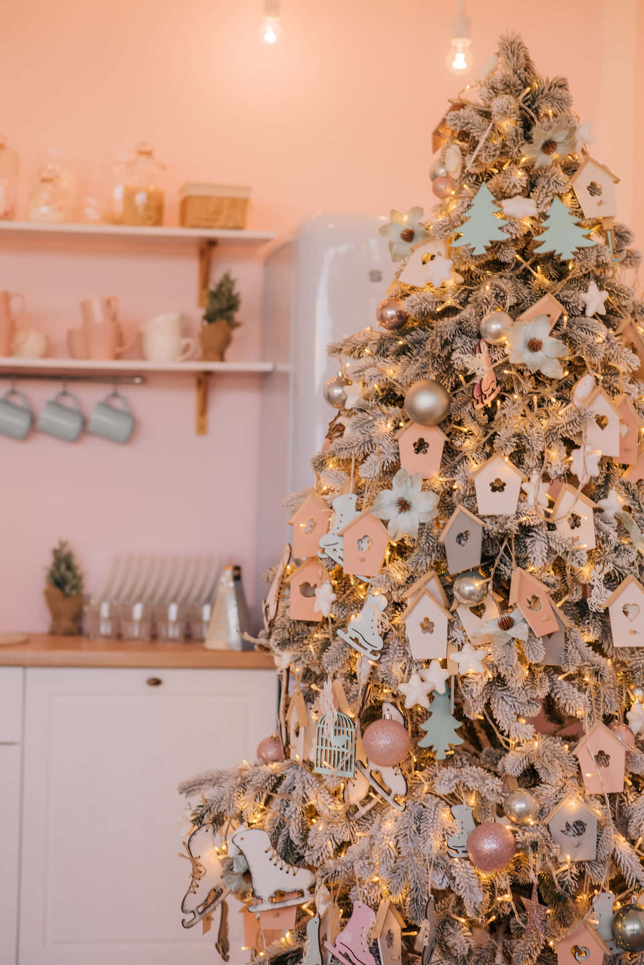 A cozy aesthetic Christmas tree adorned with ornaments, candy canes and rustic decorations. Wallpaper