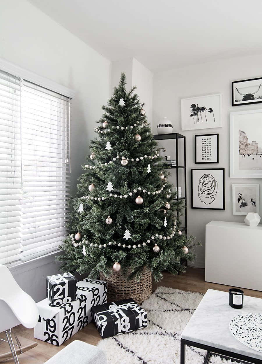 A Black And White Christmas Tree In A Living Room Wallpaper