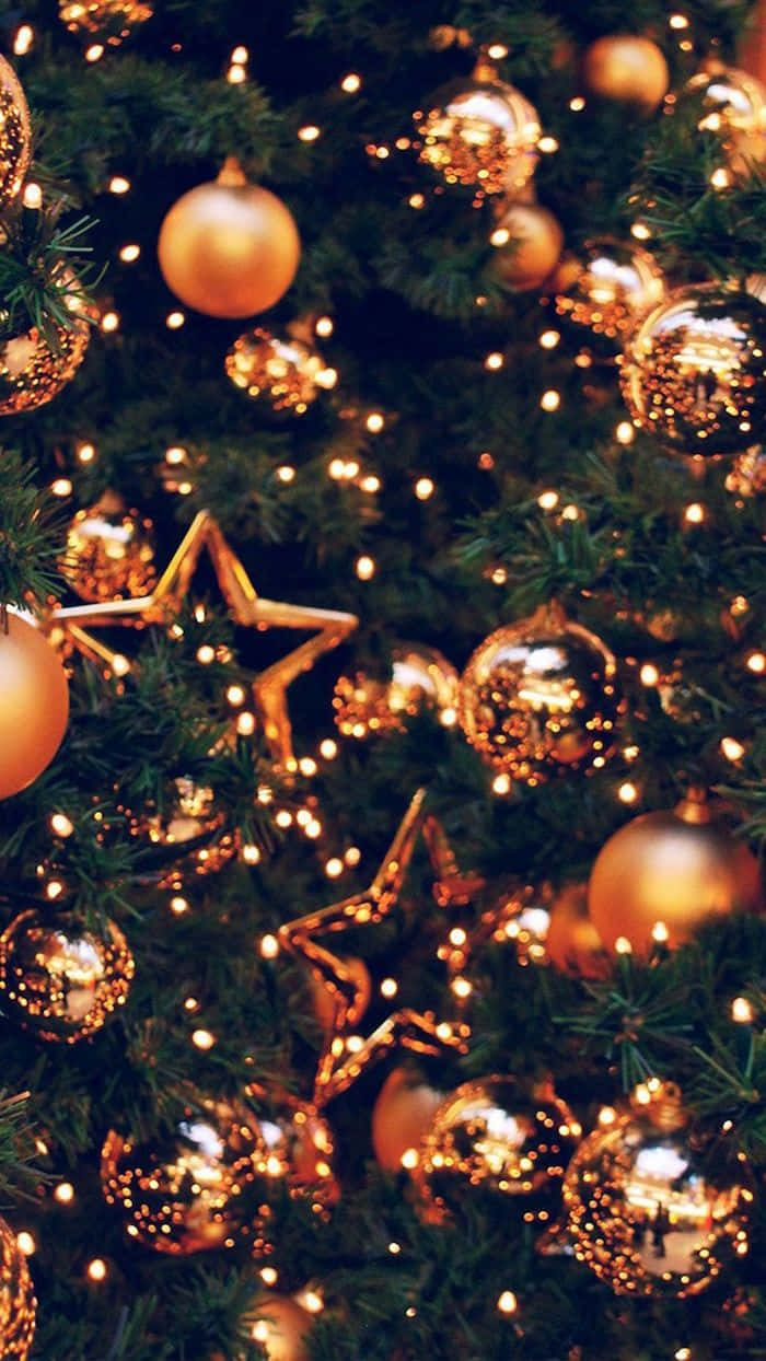 Christmas Tree With Gold Ornaments Wallpaper