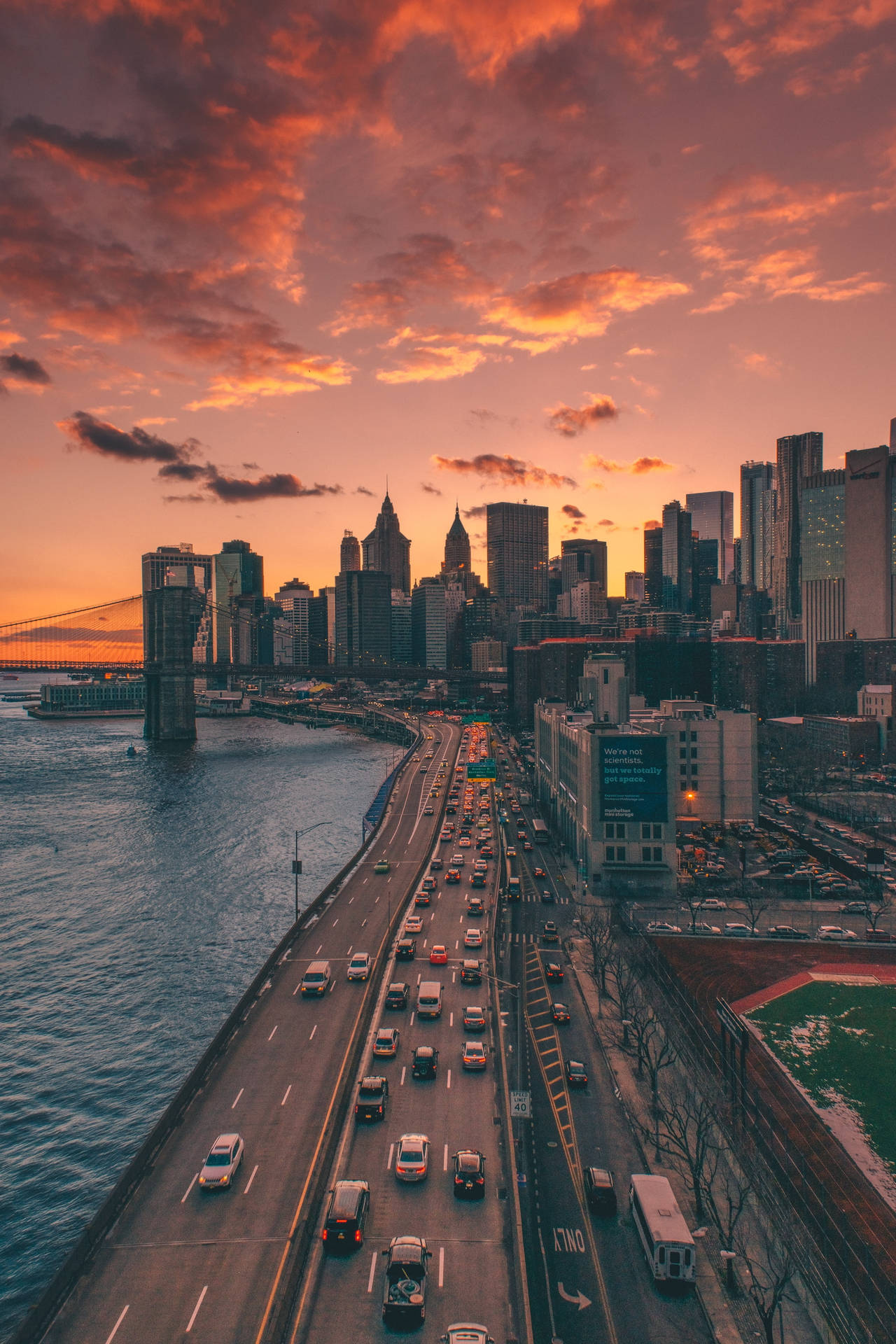 The Sun Setting Over City Buildings · Free Stock Photo