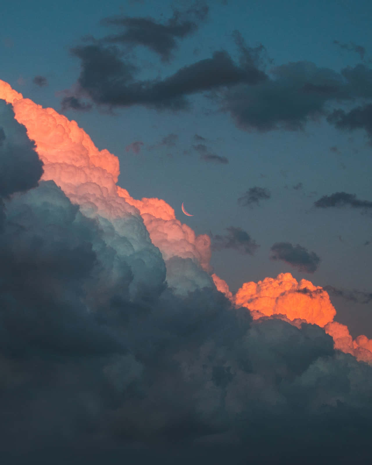 A Cloud With A Pink And Orange Color