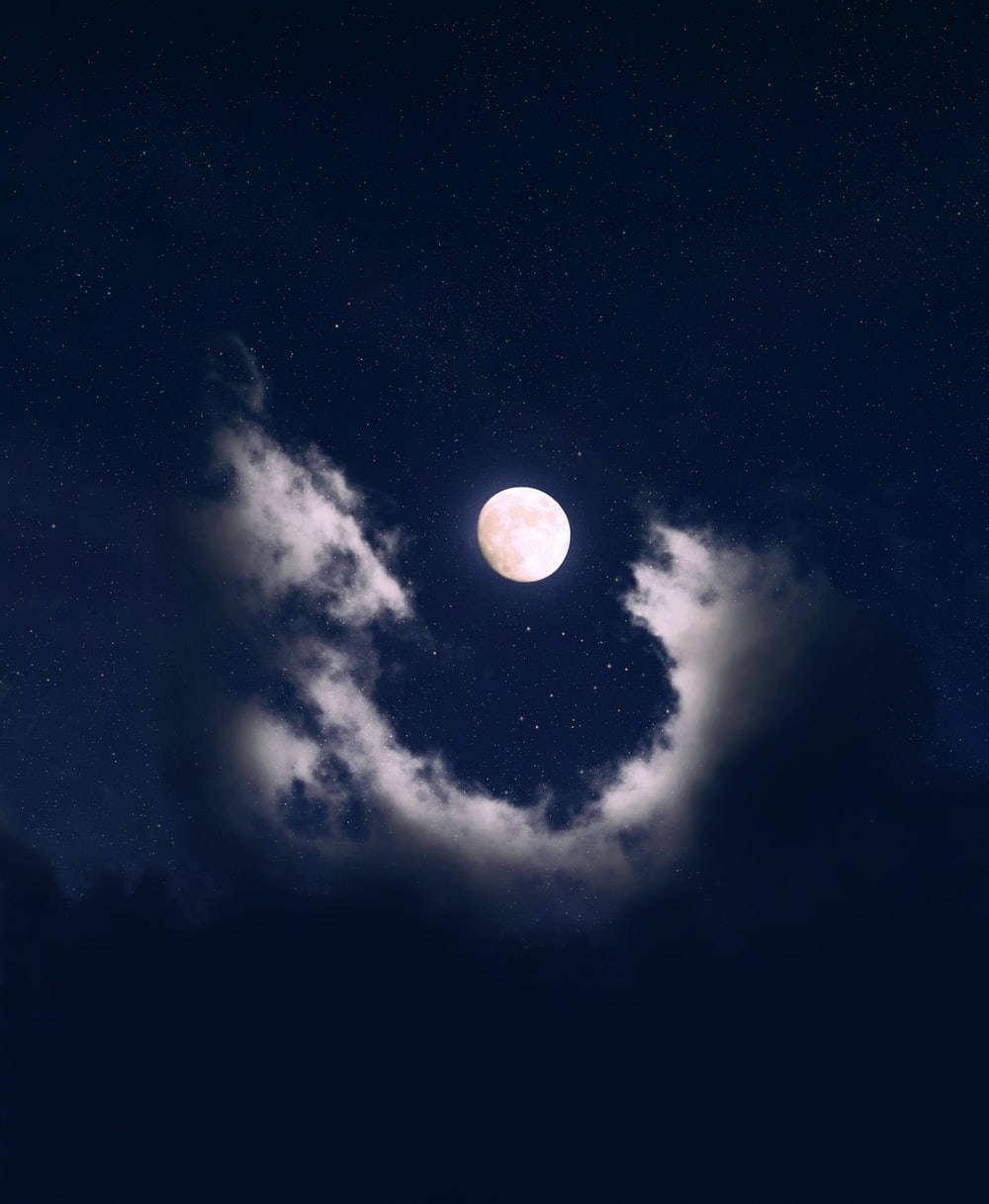 Aesthetic Clouds Surrounding The Moon Wallpaper