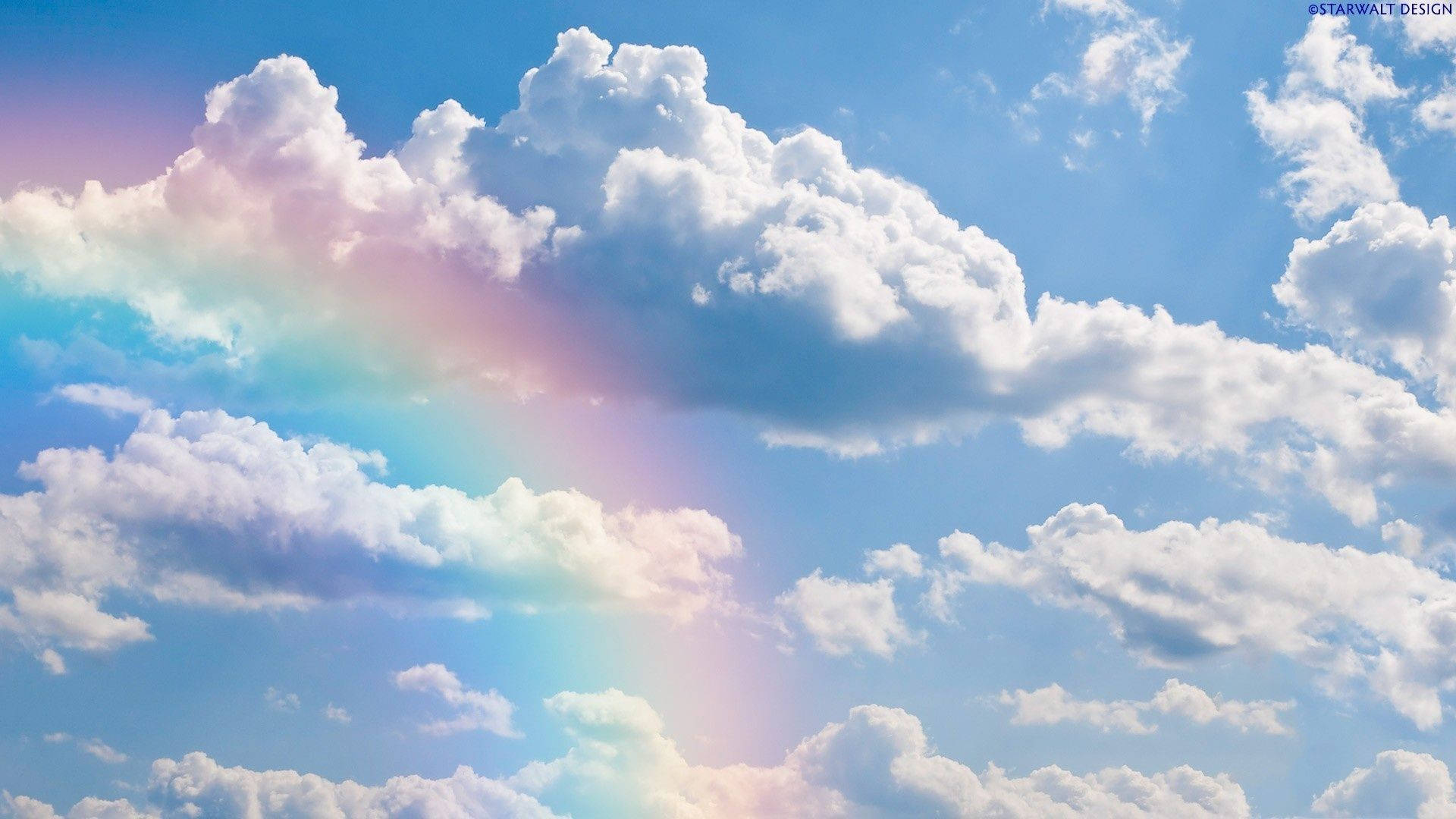 Aesthetic Clouds With Rainbow Background
