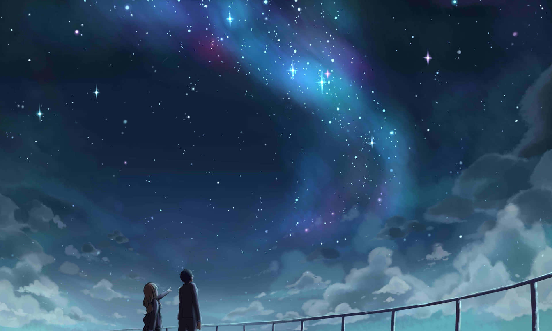 To mennesker står på en bro og kigger på stjernerne Wallpaper
