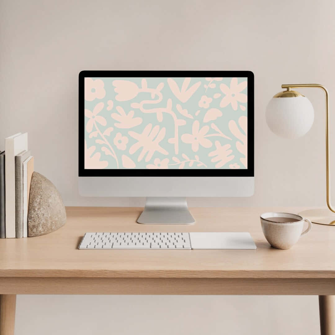 Eincomputerbildschirm Mit Einem Floralen Muster Darauf.