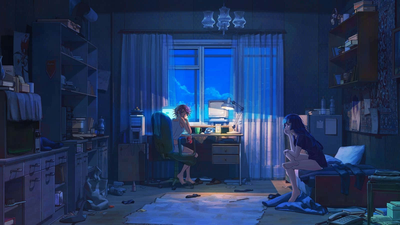 A Girl Sitting In A Room With A Computer