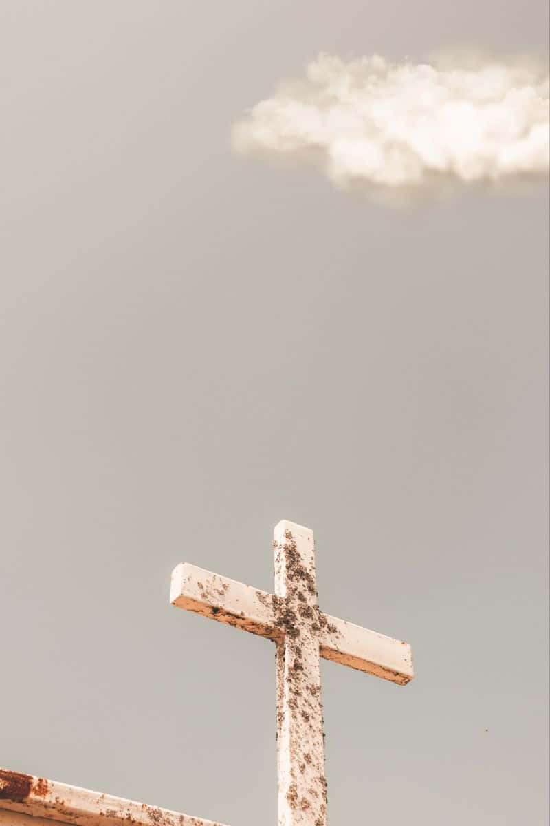Find peace in the beauty of the Aesthetic Cross Wallpaper