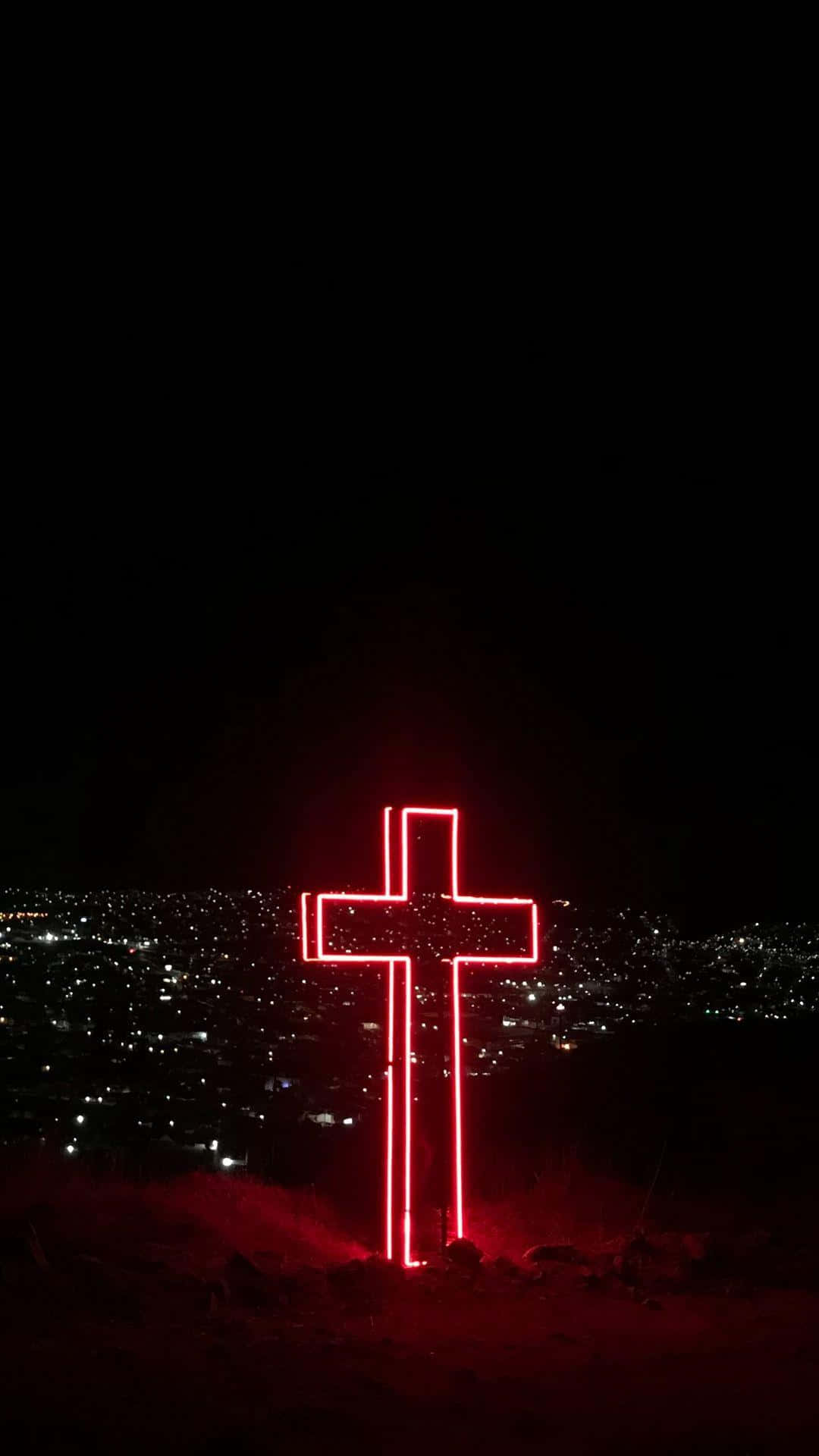A Cross of Worship Lit Up Aesthetically Wallpaper