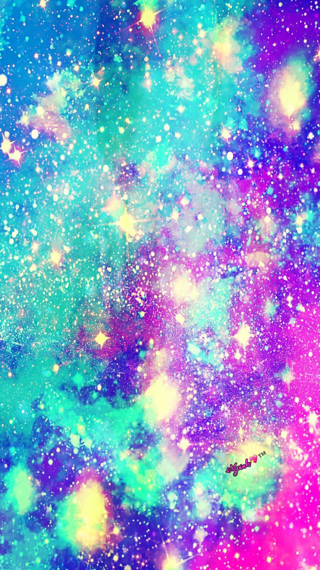 En galakse tapet med stjerner og farver Wallpaper