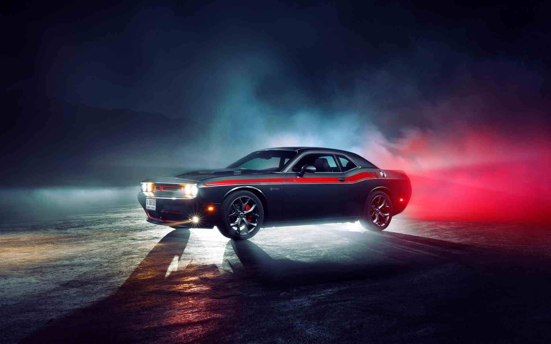 Muscle Car Magic - A Dodge Challenger Roars Into the Night Wallpaper