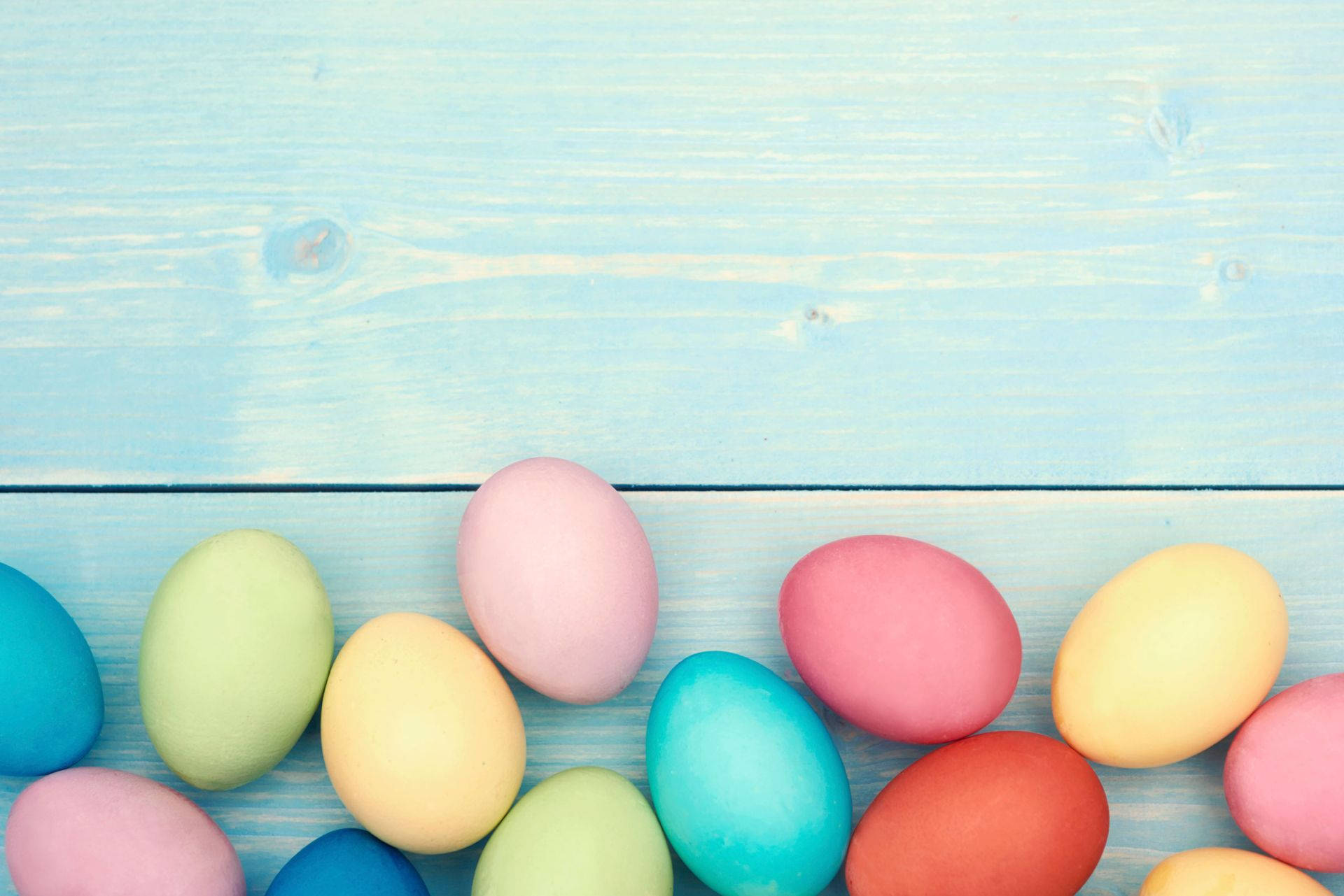 Celebrate Easter with painted eggs and pastel spring colors Wallpaper