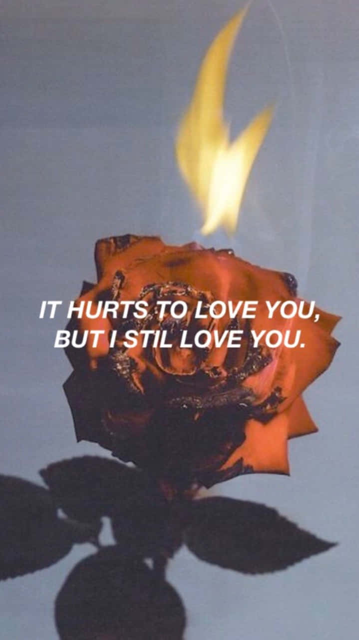 Aesthetic Fire Love Hurts Quote Wallpaper