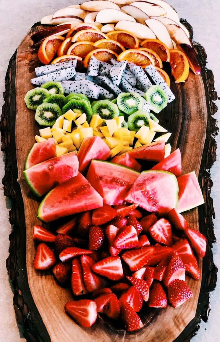 A Fruit Platter With A Variety Of Fruits On It