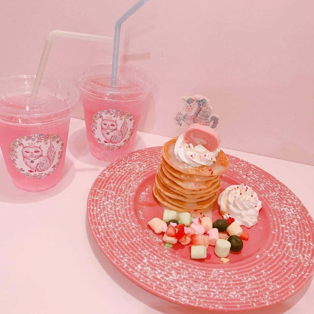 A Plate With Pancakes, Strawberries And A Drink