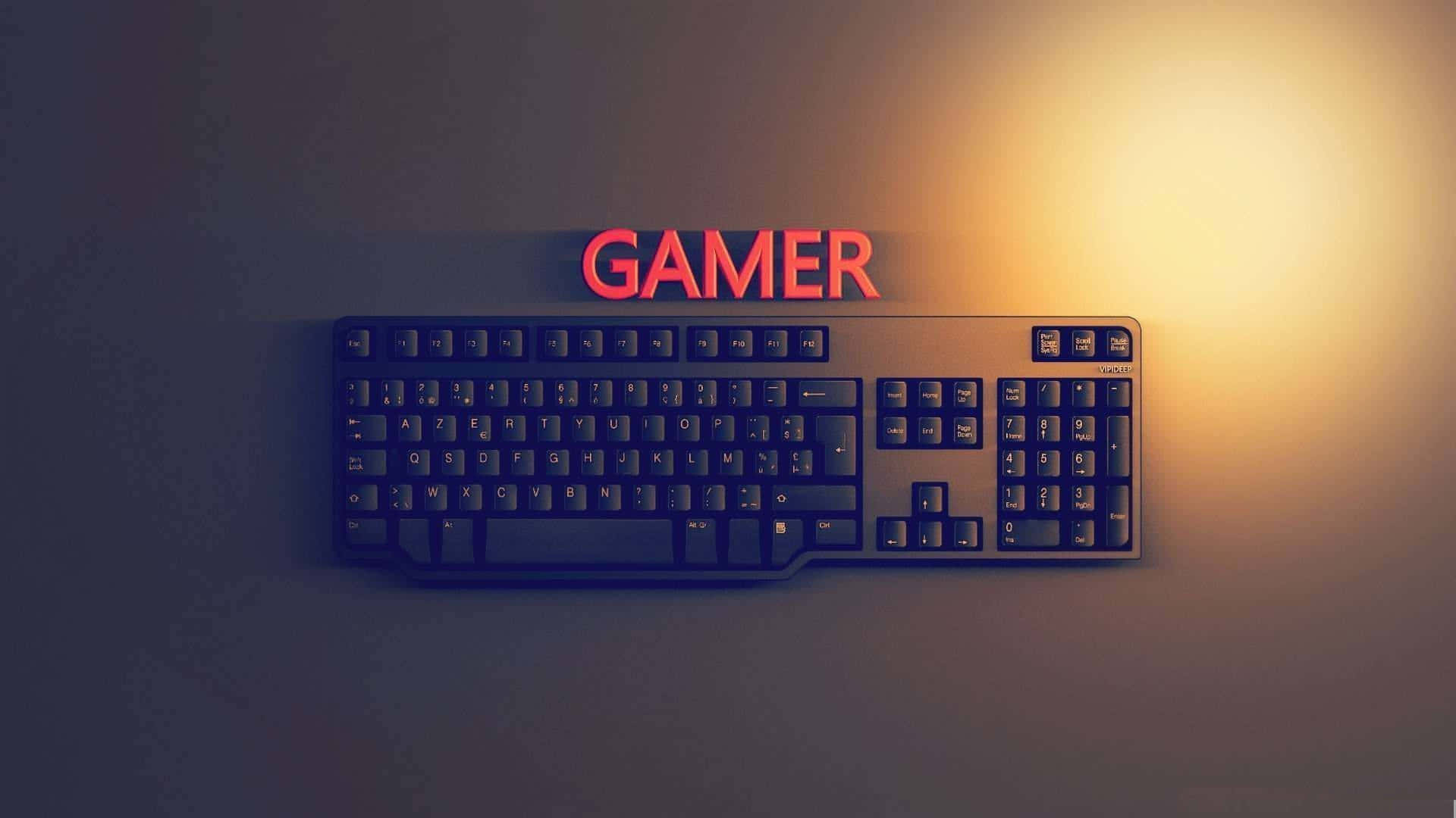Et computer tastatur med ordet gamer på det. Wallpaper