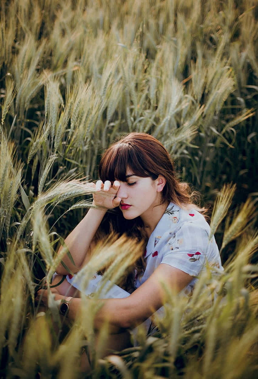 Aesthetic Girl Grass Sit Down Wallpaper