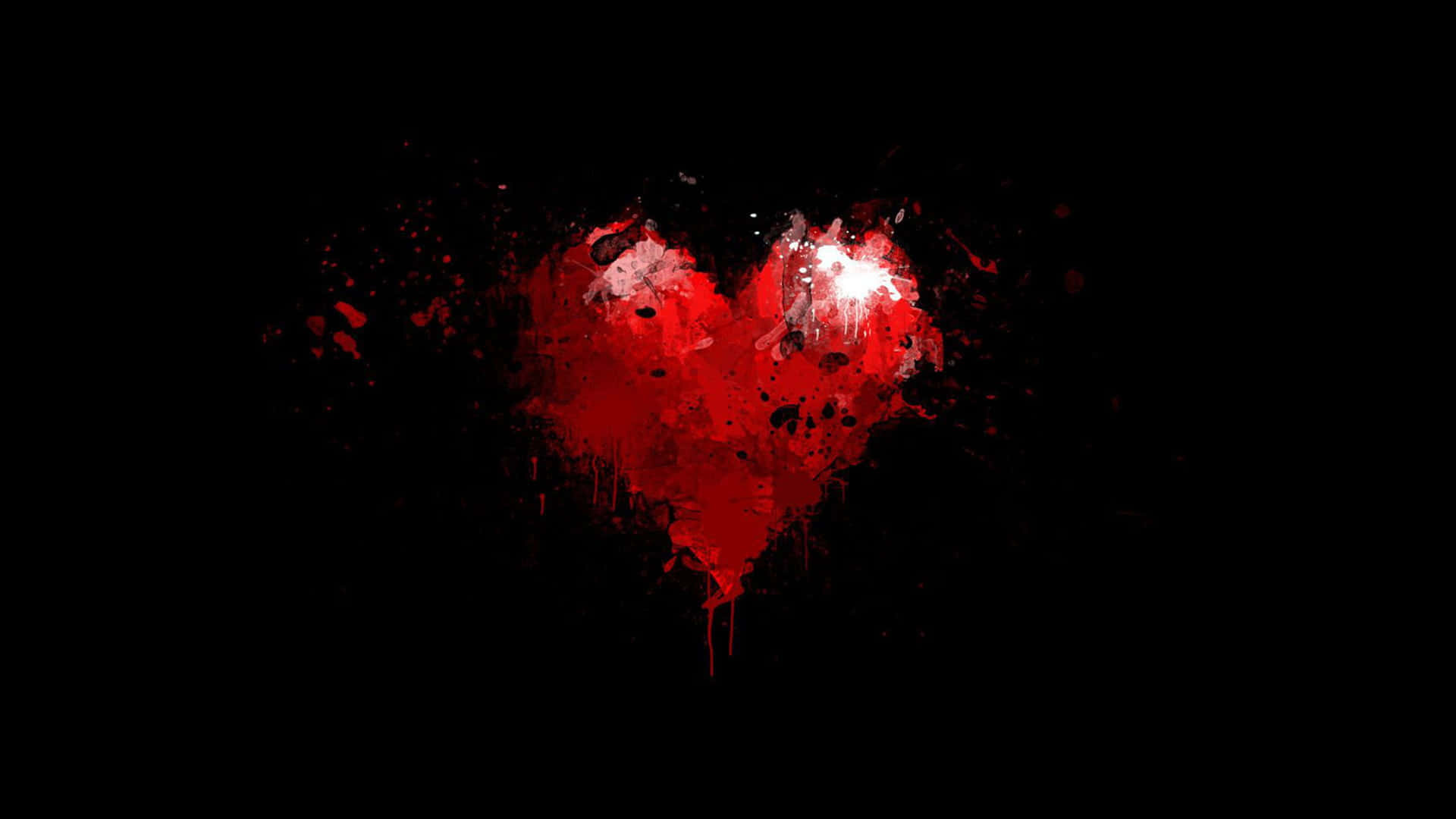 A Red Heart With Blood Splatters On A Black Background