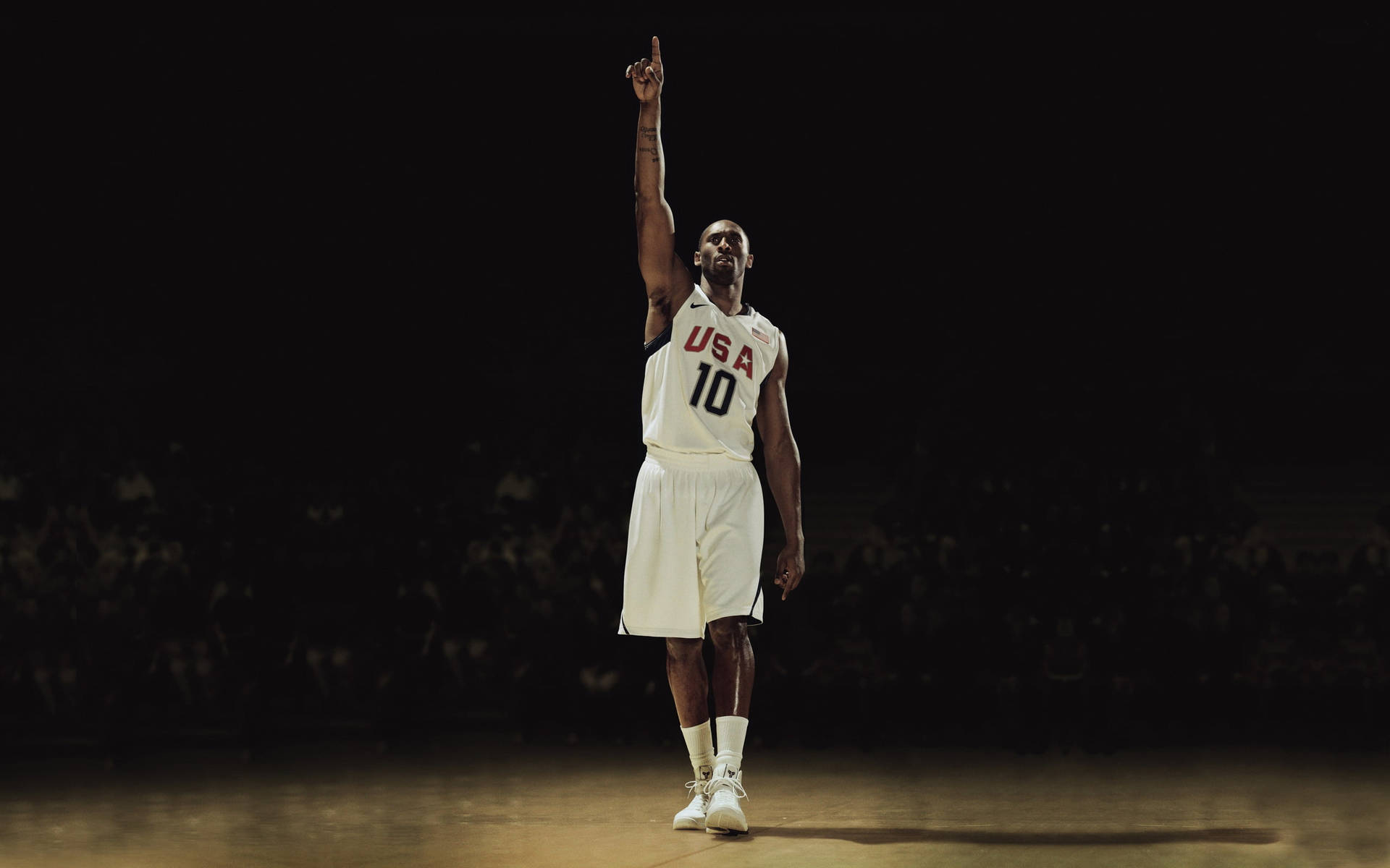 Aesthetic Kobe Bryant Raising A Hand Wallpaper