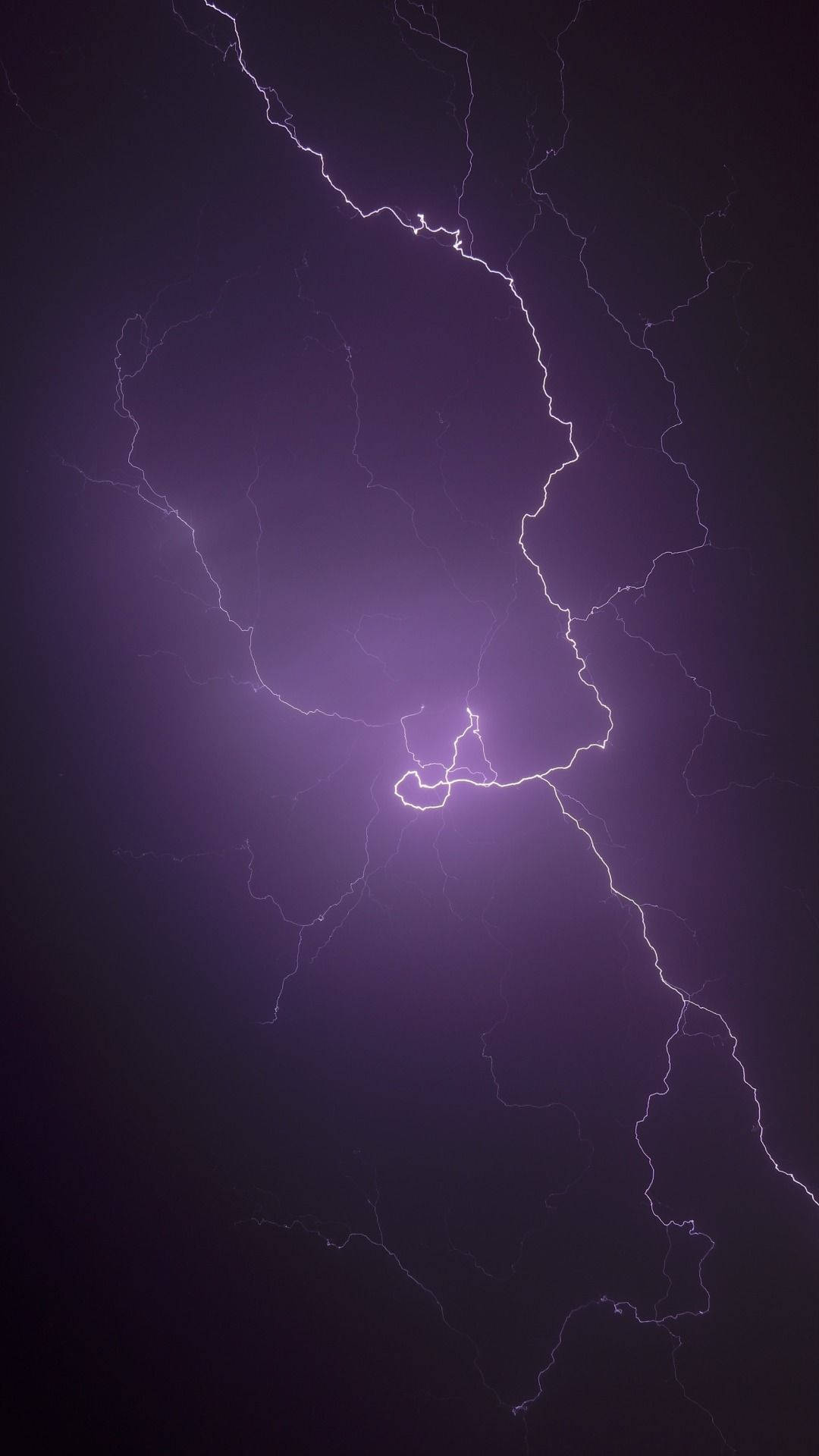Witness the beauty of a striking lightning bolt Wallpaper