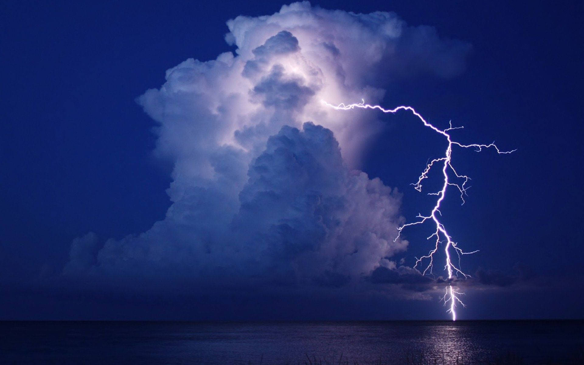 Aesthetic Lightning Clouds By The Sea Wallpaper