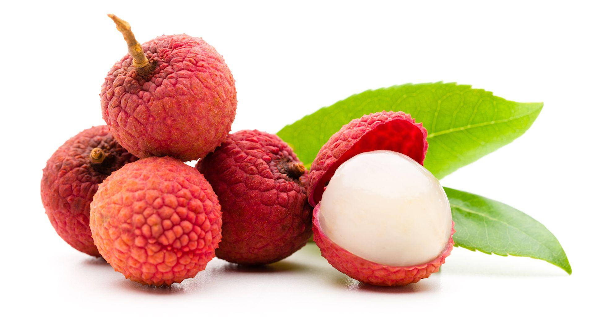 Aesthetic Lychee Fruits And Leaves Wallpaper