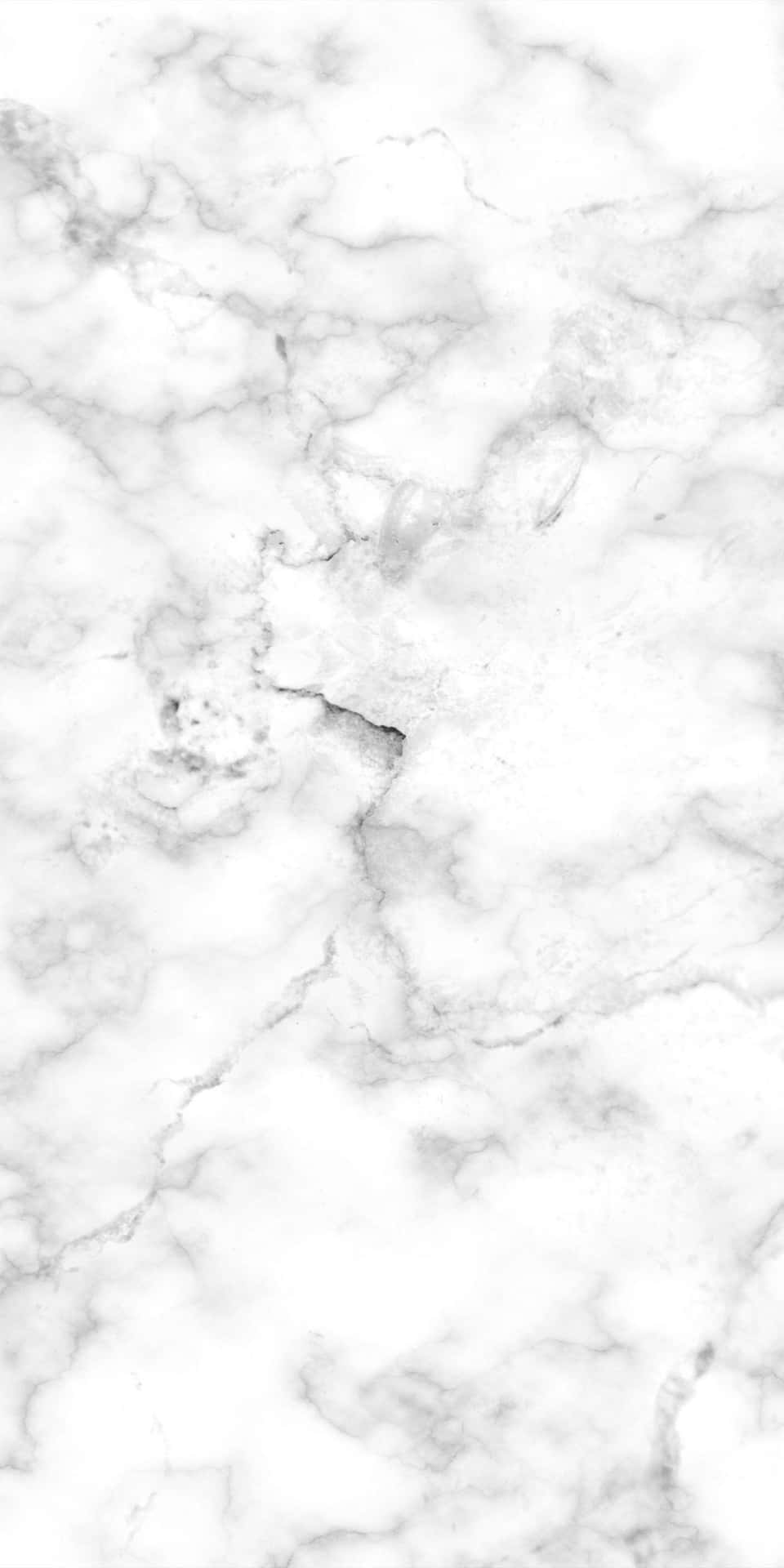 A White Marble Texture With A Black Background