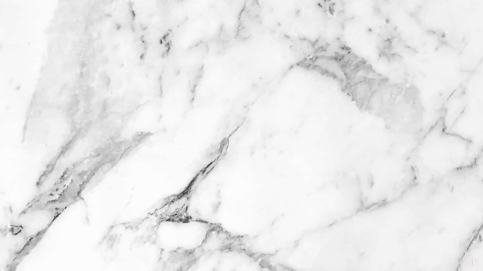 A Close Up Of A White Marble Wall Wallpaper