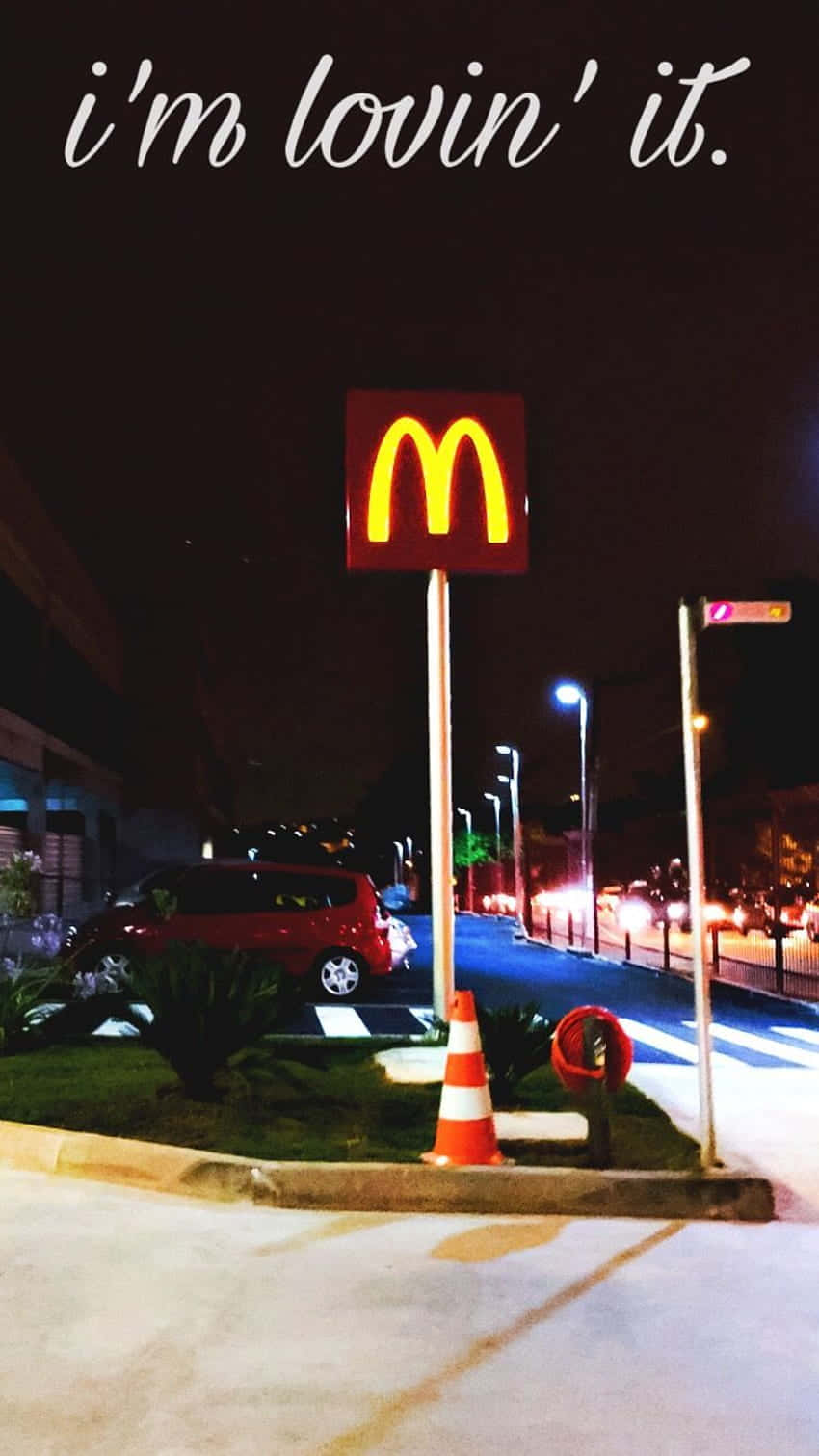 A Mcdonald's Sign With The Words I'm Lovin It Wallpaper