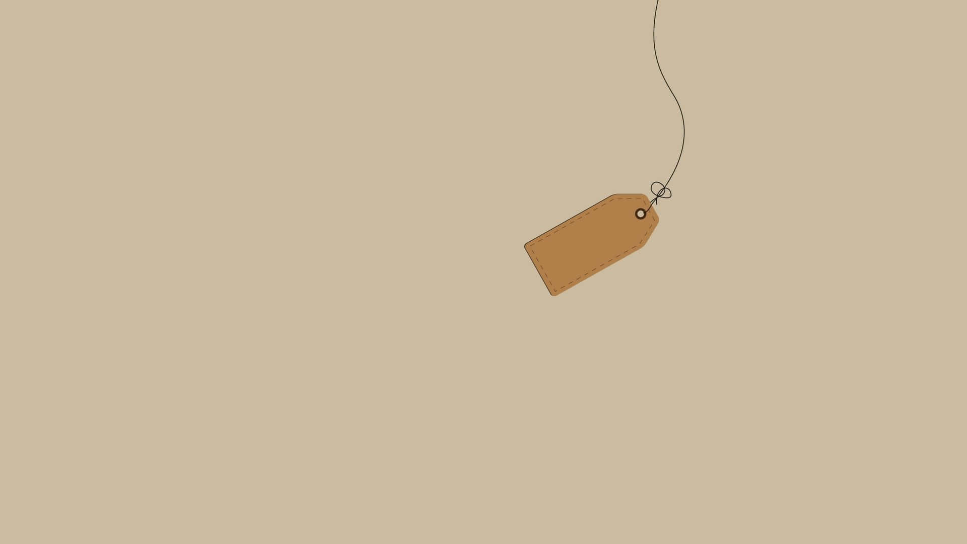 A Brown Tag Hanging From A String