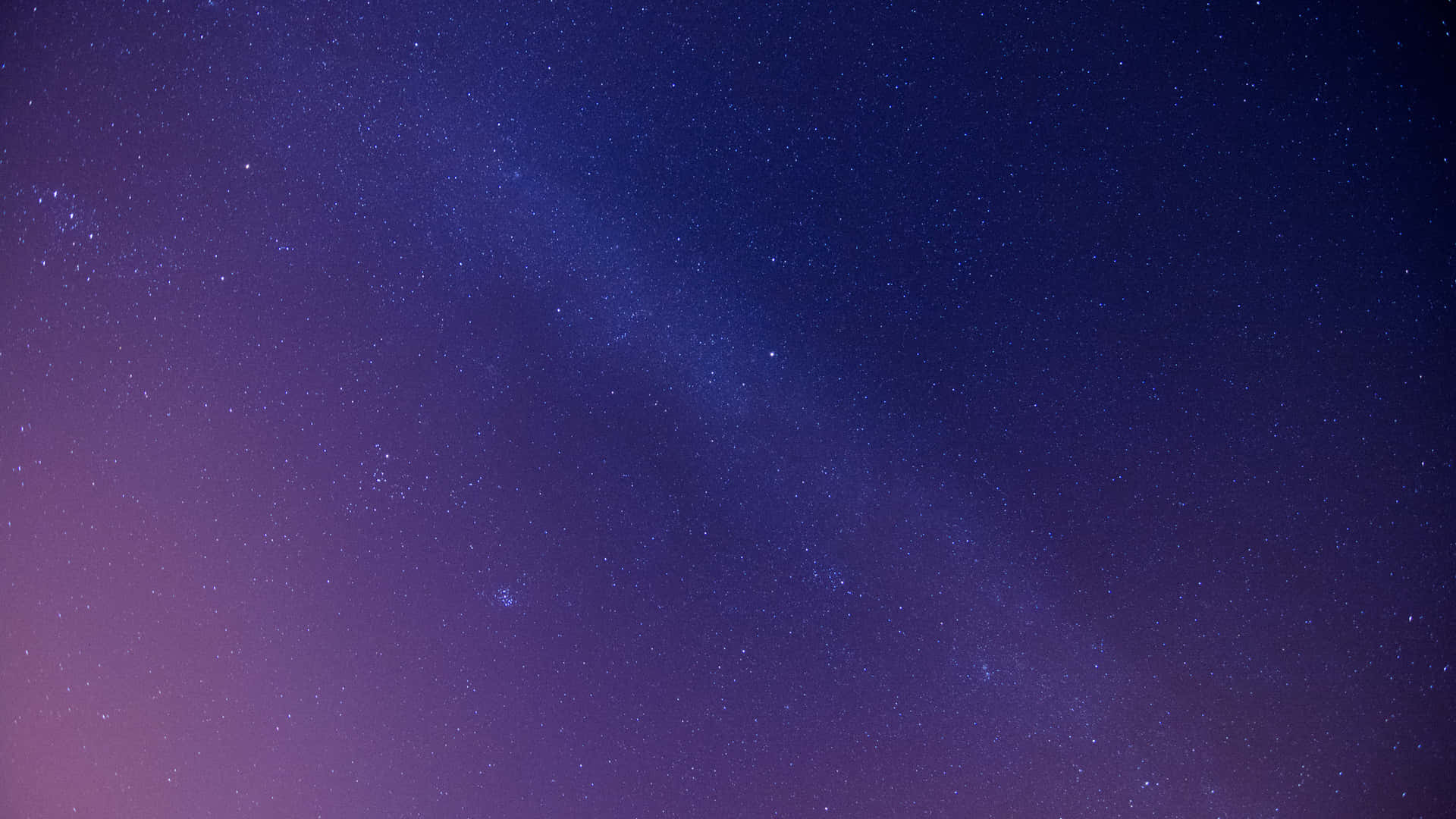 En smuk udsigt over nattehimlen, der skinner med stjerner og galakser Wallpaper