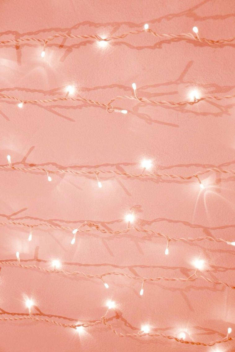 Aesthetic Peach Pink Christmas Lights Wallpaper