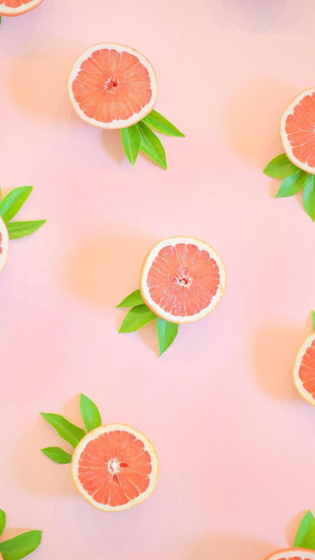 Aesthetic Pink Grapefruit With Leaves Wallpaper