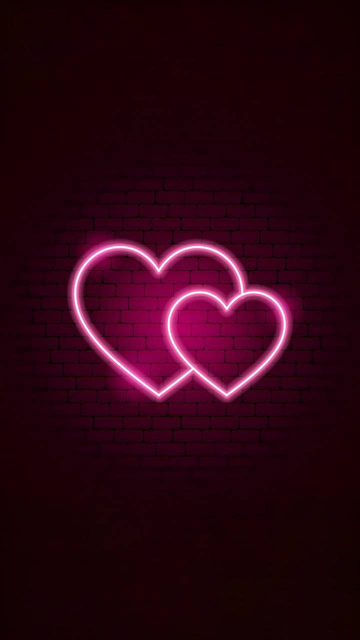 Aesthetic Pink Iphone Two Neon Hearts Wallpaper