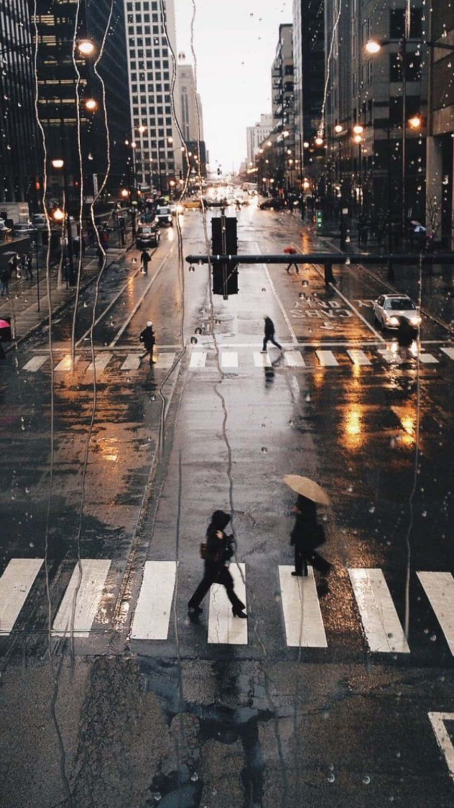 Aesthetic Rain On Wet City Roads Wallpaper