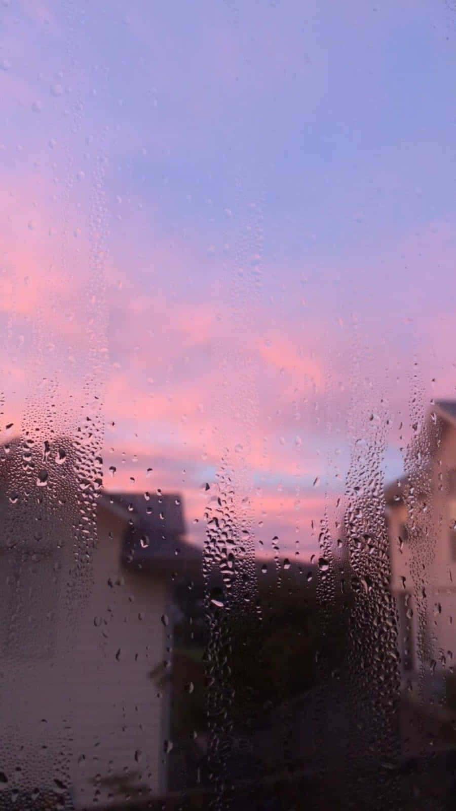 Æstetisk regn og lilla-rosa himmel Wallpaper