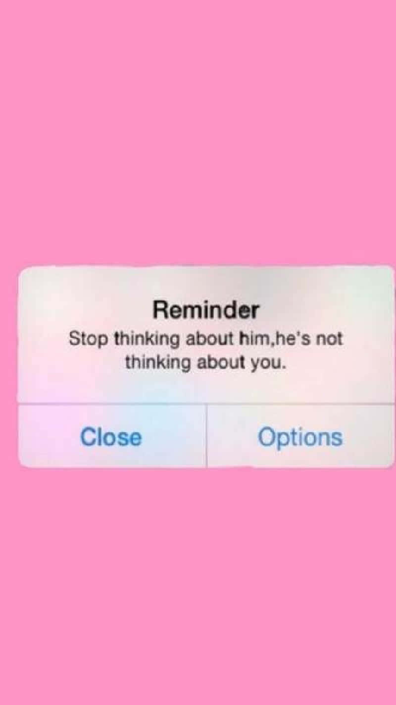 En pink skærm med teksten påmindelse stop med at tænke, han tænker ikke på dig Wallpaper