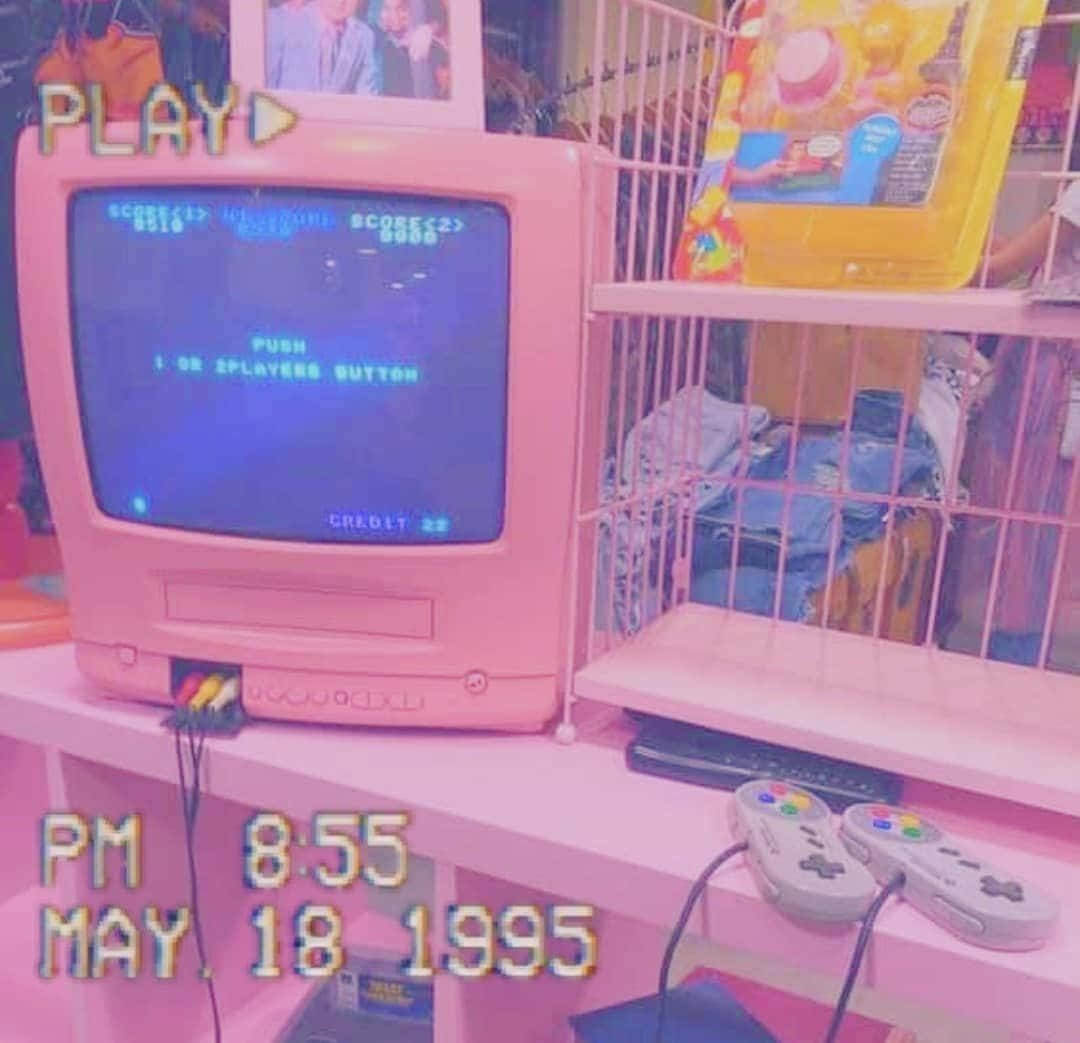 A Pink Television With A Pink Screen And A Pink Keyboard