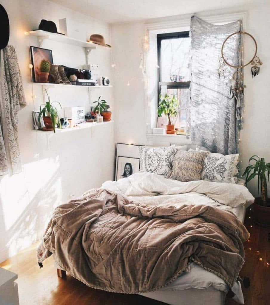 A Bedroom With A Bed And A Bedside Table
