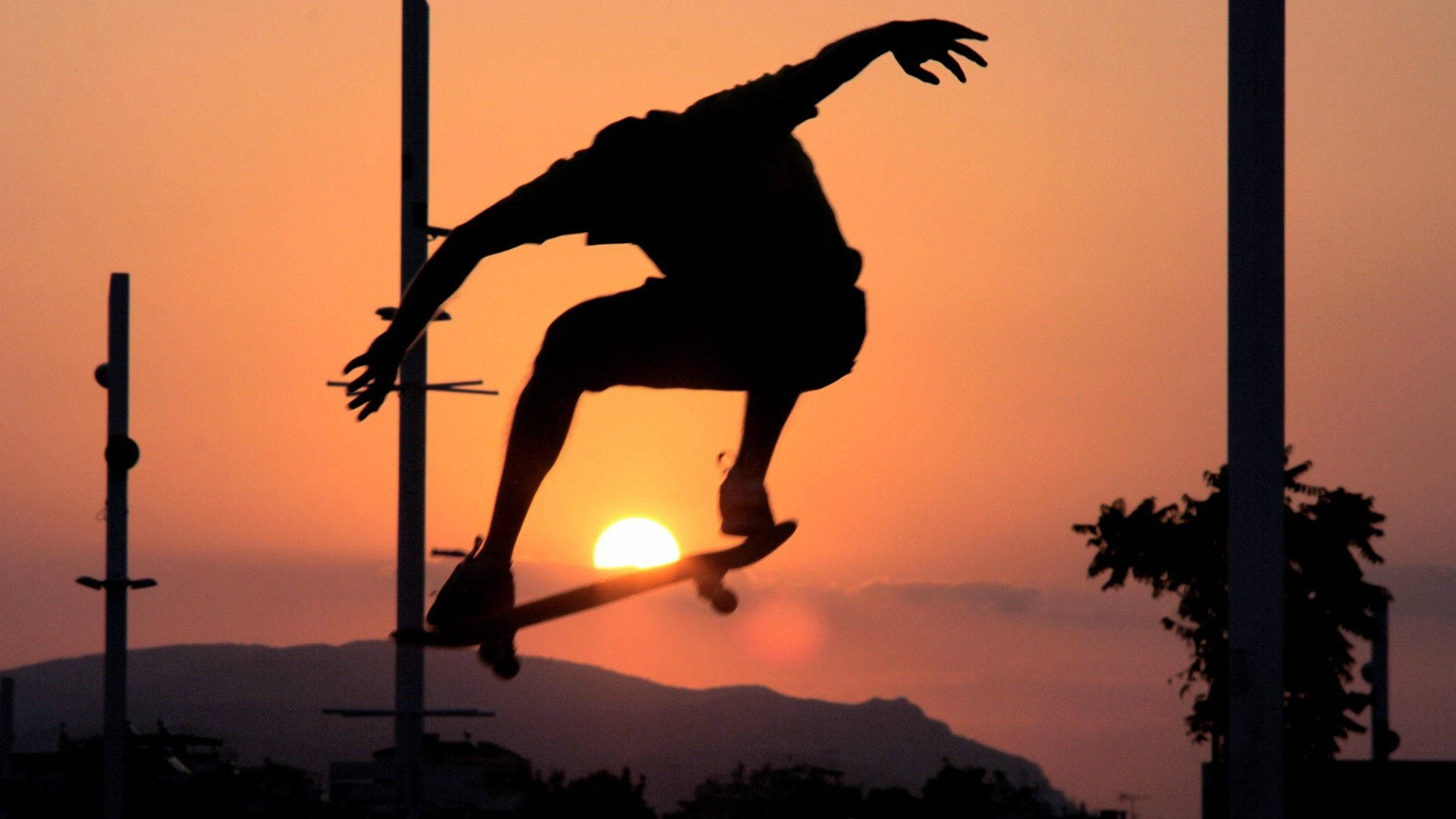Aesthetic Skater Boy With Sunset Wallpaper