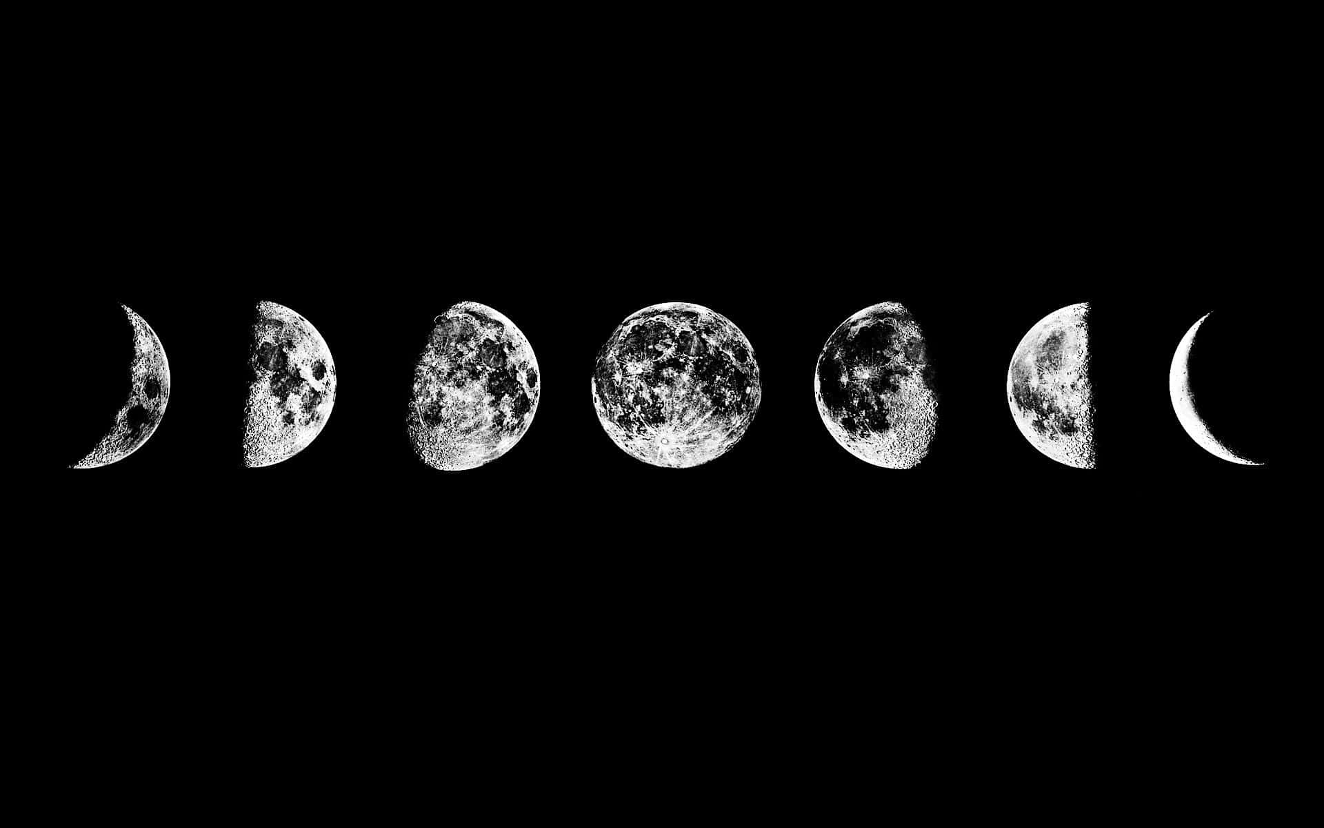De månefaser i sort og hvid Wallpaper