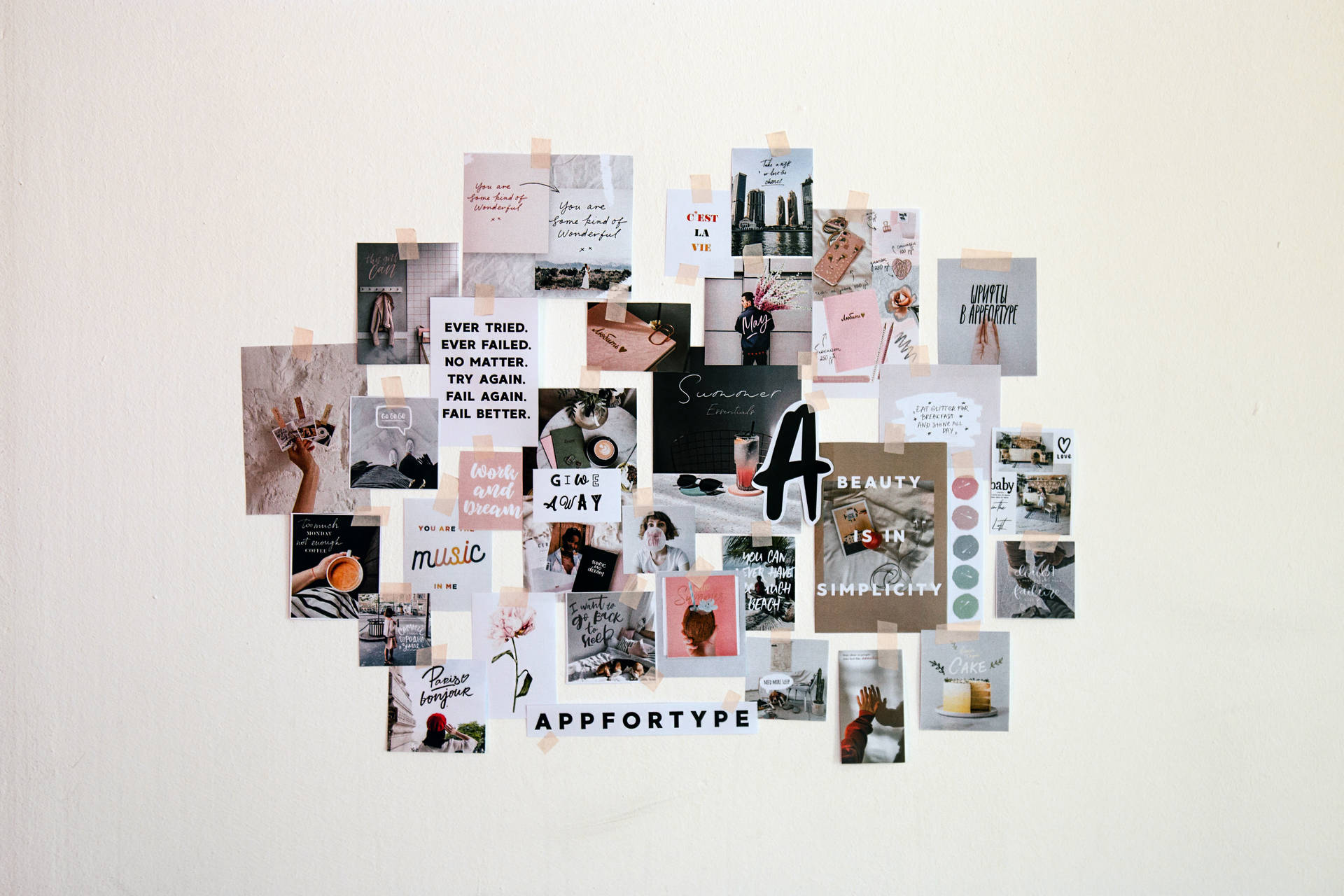 Aesthetic wallpaper of white wall filled with pictures and clippings. 