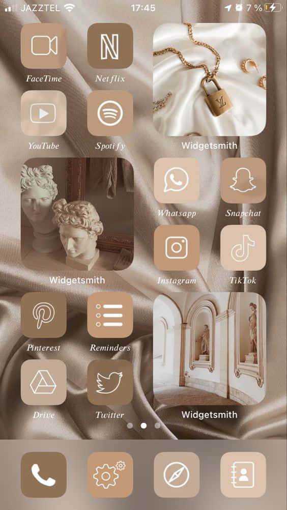 A Screenshot Of A Beige And Gold Theme