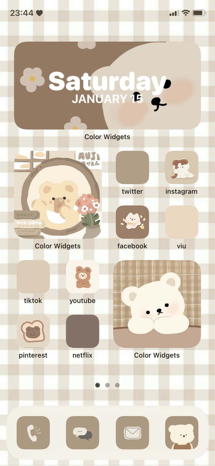 A White And Brown Phone Screen With A Bear Theme
